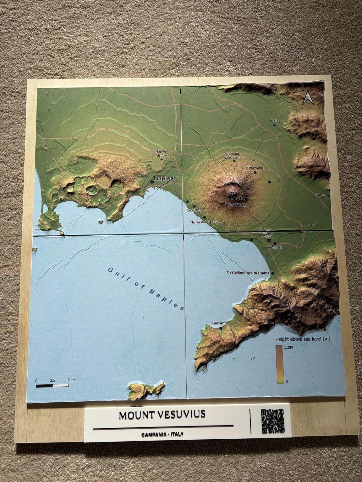 Complete Mount Vesuvius relief model on a plywood board, with four map-covered terrain tiles and a title plaque.